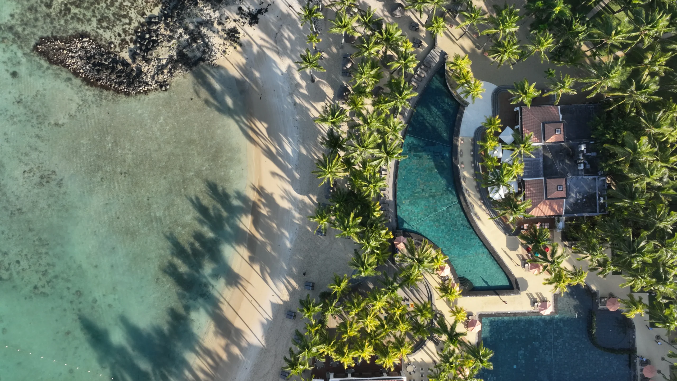 mauricia beachcomber mauritius aerial pool and beach along the lagoon coastline