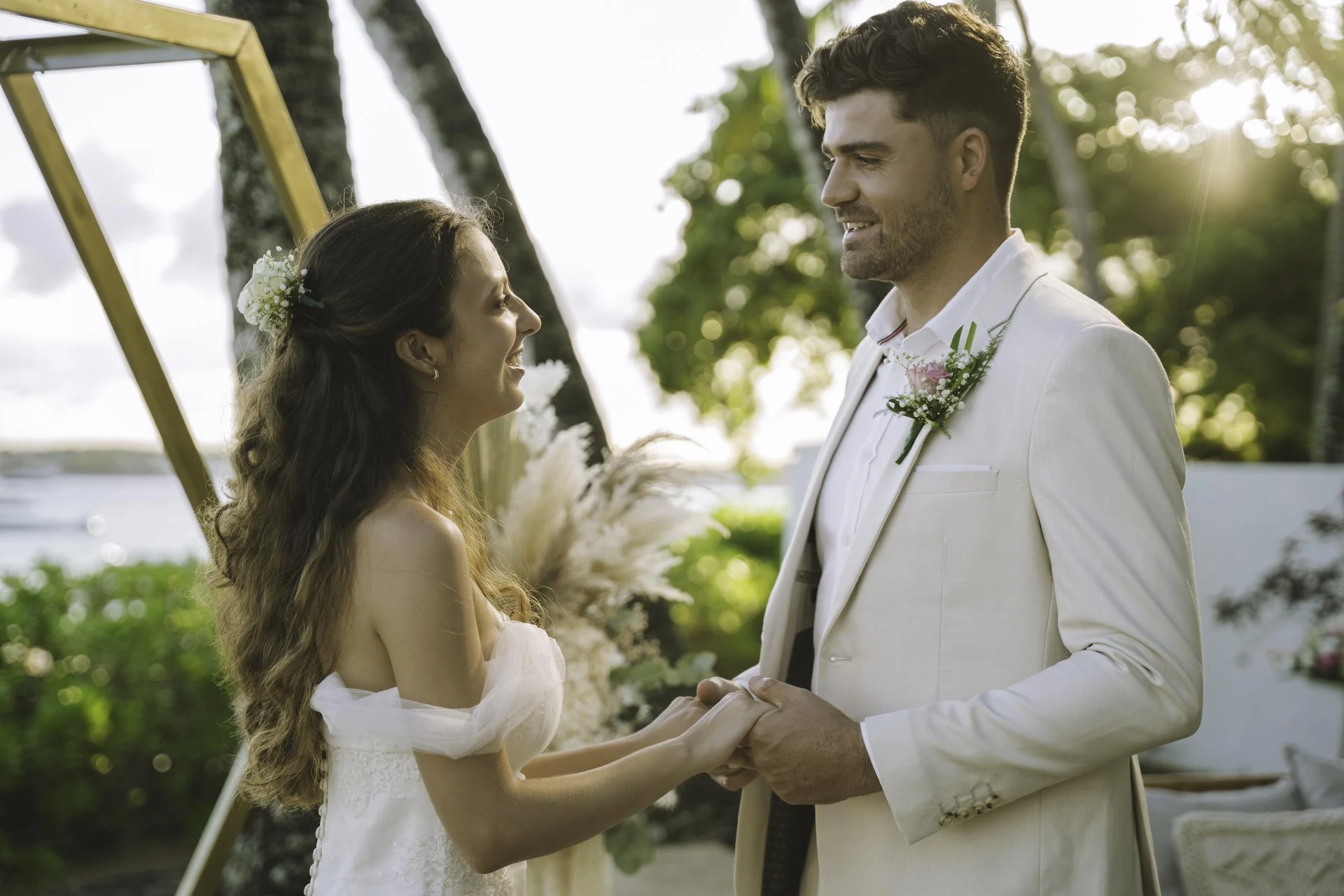 mauricia mauritius wedding with bride and groom celebrating on tropical beachfront
