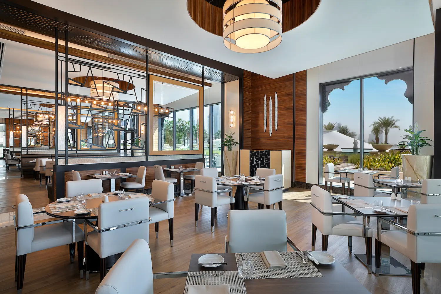 mowsem dubai at hilton dubai palm jumeirah with modern dining area and casual seating