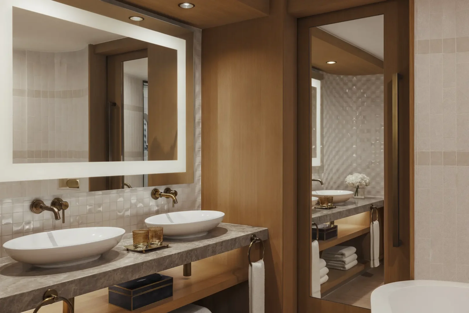 bathroom in ocean deluxe room at Jumeirah Beach Hotel with modern fittings and walk-in shower