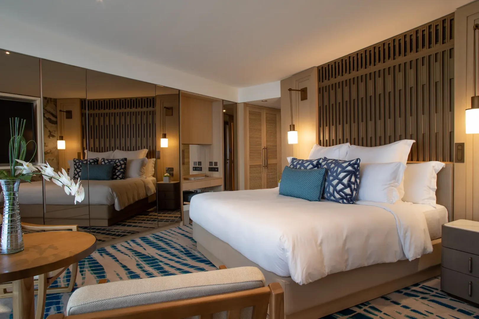 bed in ocean deluxe room at jumeirah beach hotel with sea view