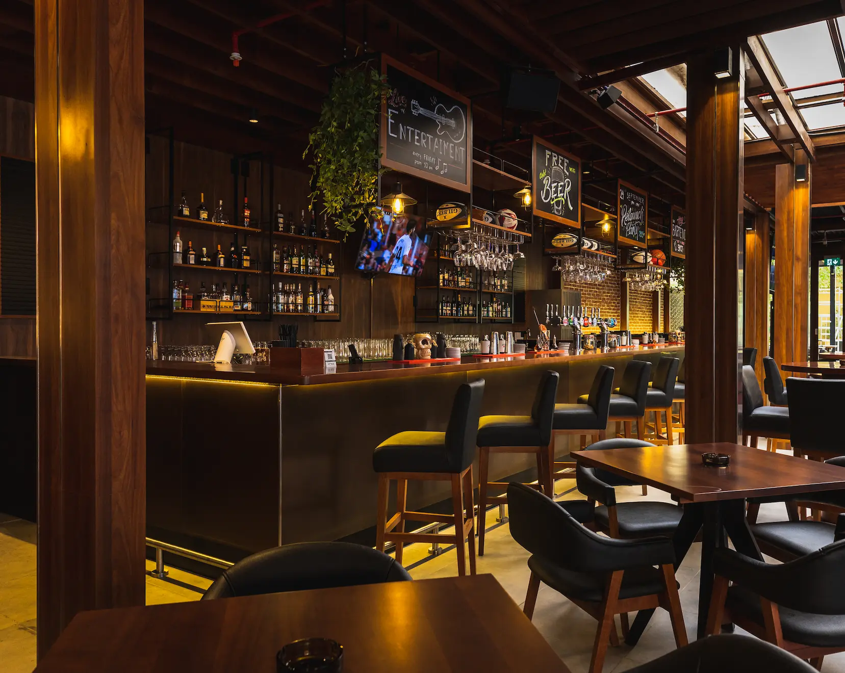 offside sports bar at ja ocean view hotel with casual seating and large screen displays