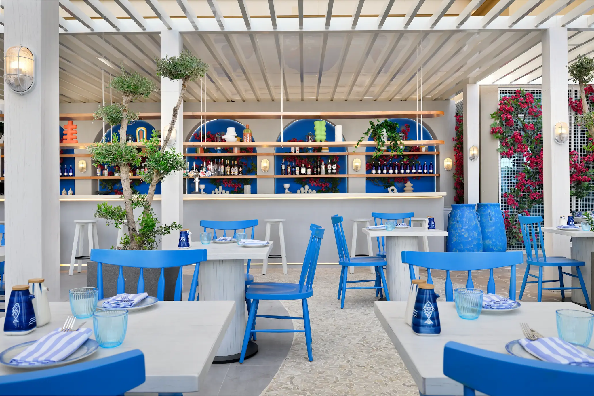 oia greek restaurant at ja ocean view hotel with mediterranean décor and dining area