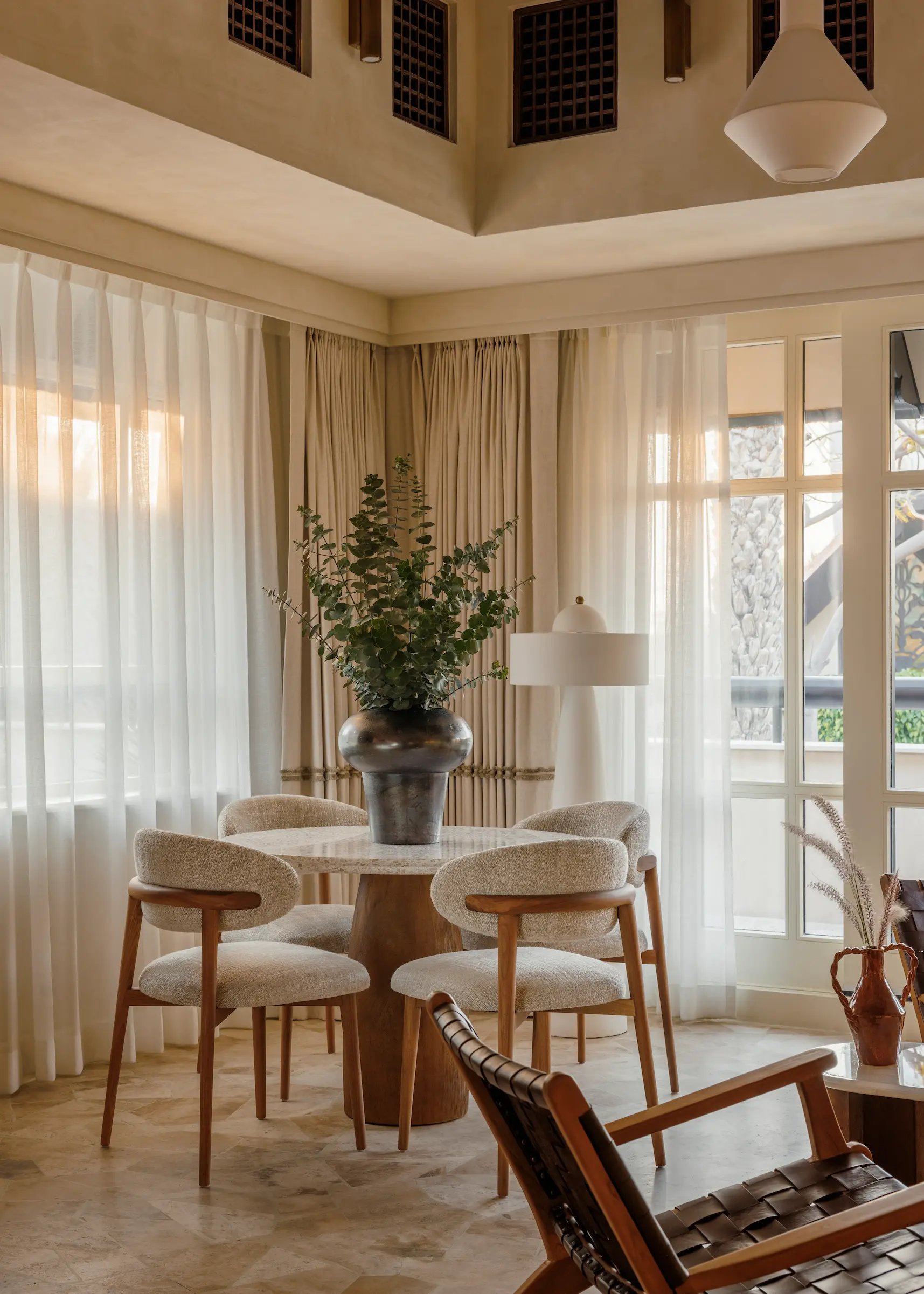 dining area in one bedroom al bahar villa at Jumeirah Beach Hotel with modern furnishings, intimate seating and villa terrace views