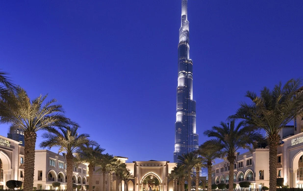 palace downtown dubai with iconic burj khalifa view overlooking burj lake and downtown dubai skyline