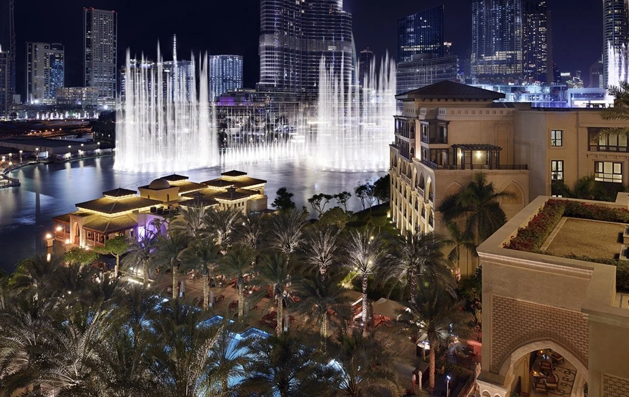 palace downtown dubai urban resort setting overlooking burj lake with views of burj khalifa and downtown dubai skyline