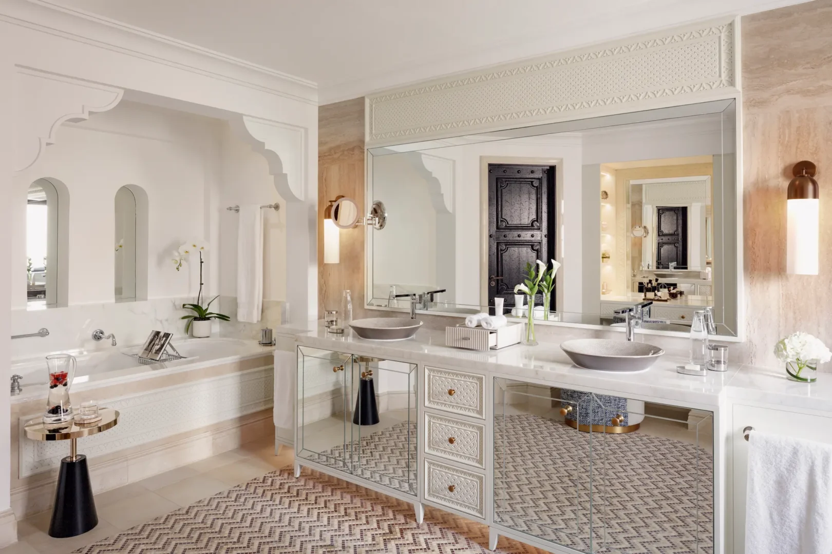 bathroom of palm house lagoon room at jumeirah dar al masyaf with modern fixtures and elegant design
