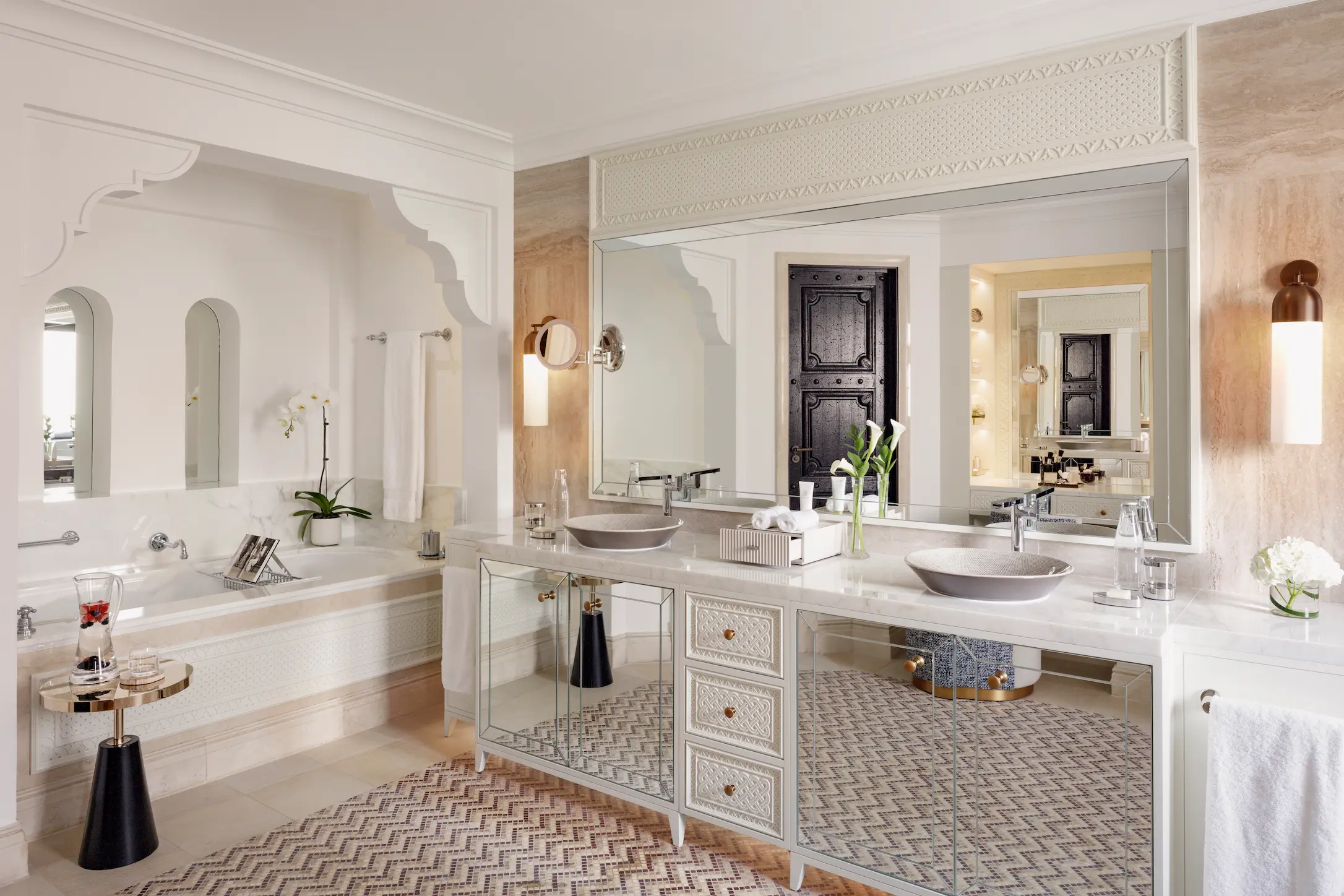 bathroom of palm house lagoon room at jumeirah dar al masyaf with modern fixtures and elegant design