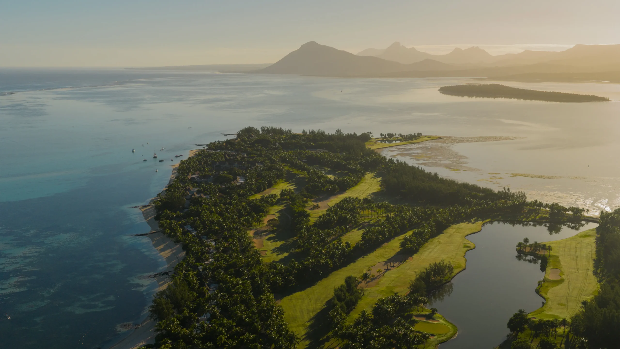 paradis beachcomber mauritius aerial view of the turquoise ocean and tropical coastline surrounding the resort
