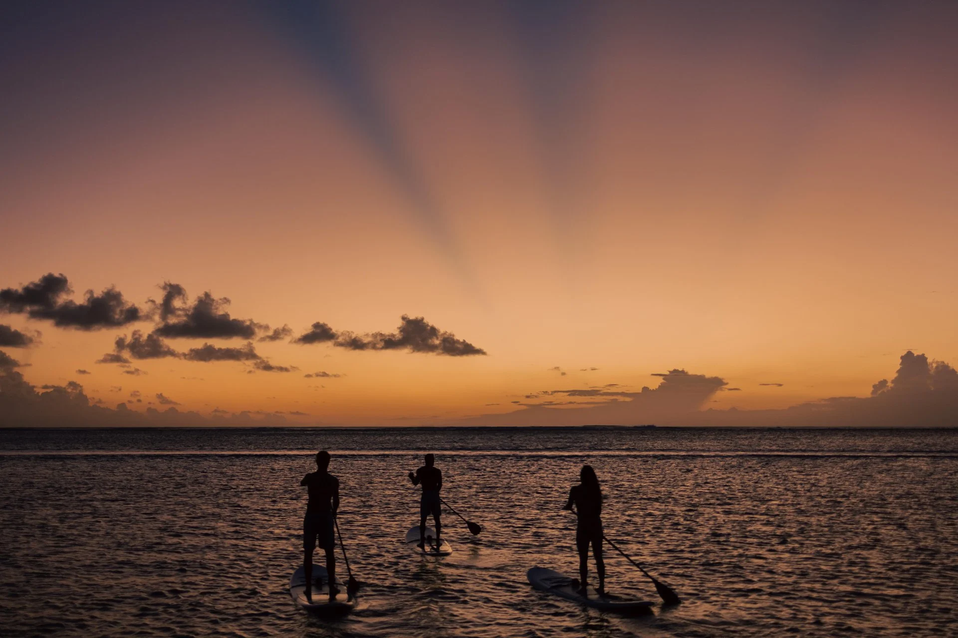 guests doing padel at night at paradis mauritius