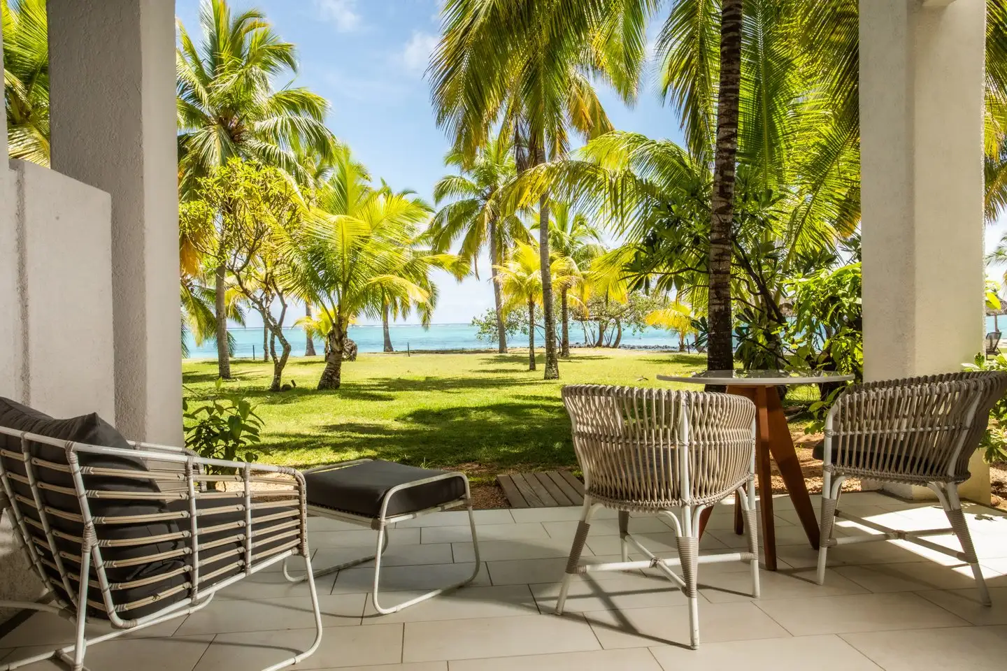 terrace of an ocean beachfront room at paradis mauritius