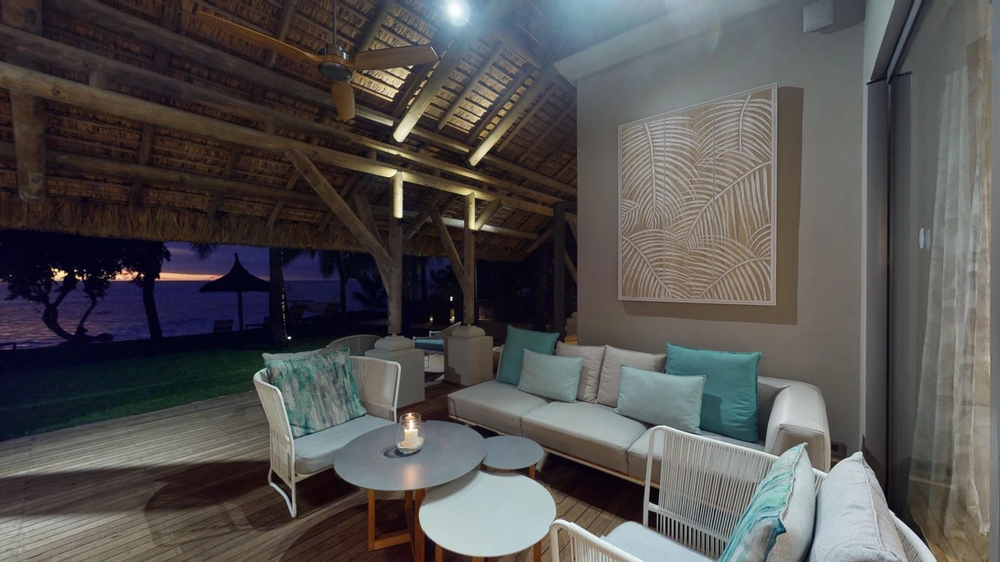 paradis paradis villa terrace at night with beachfront view