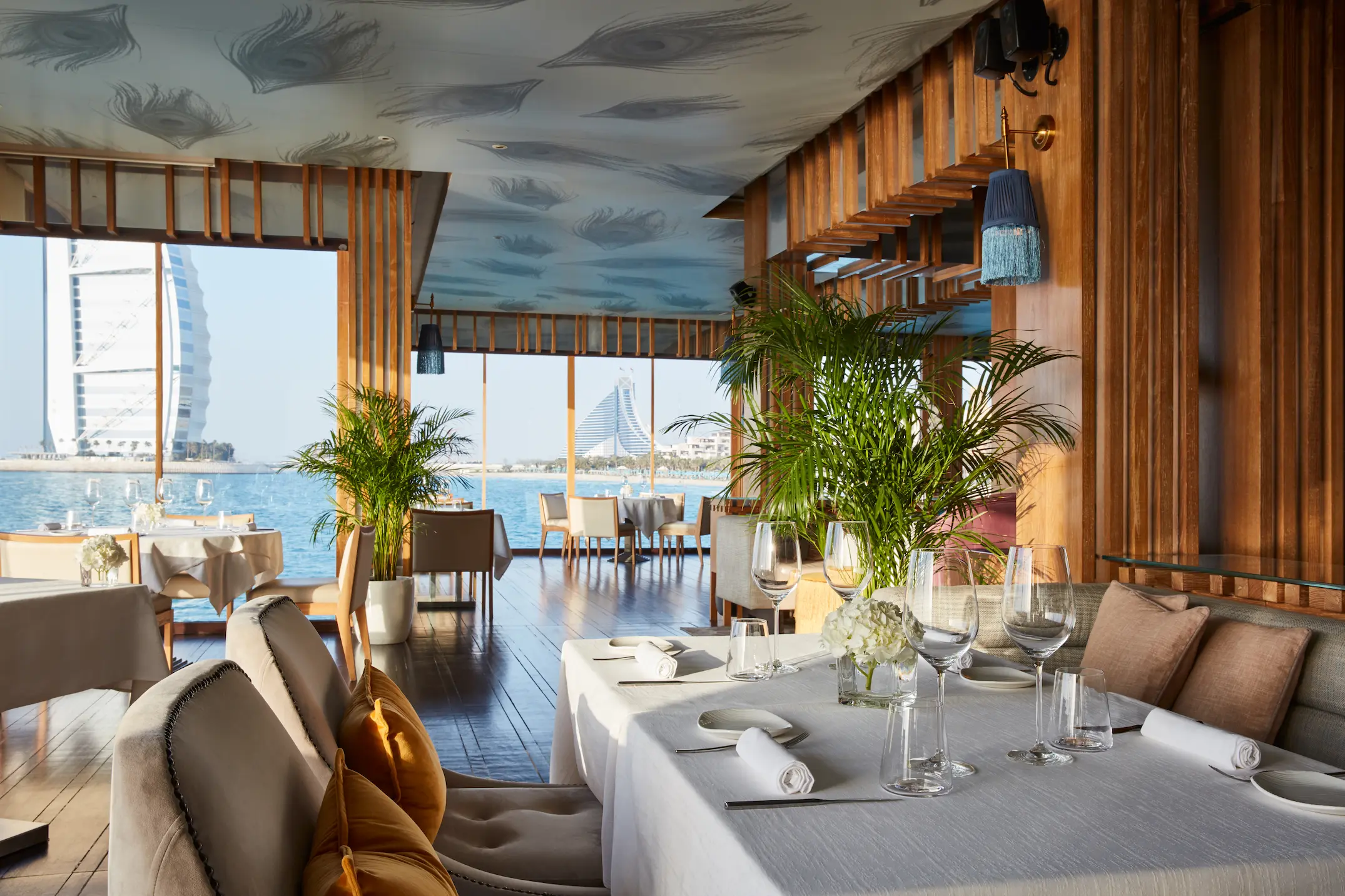 interior of pierchic at jumeirah al qasr showcasing elegant italian dining with ocean views and refined décor