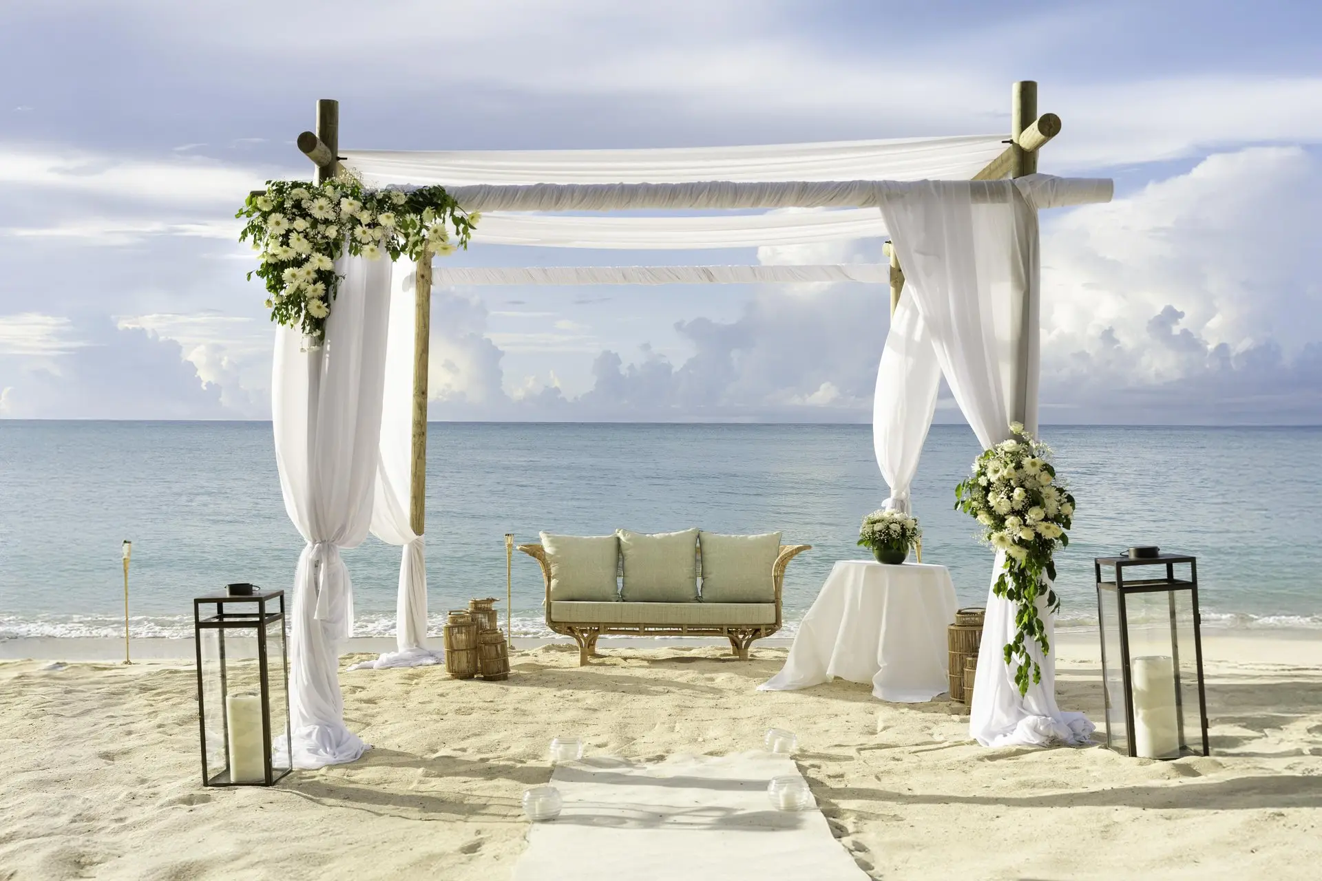 royal palm mauritius wedding set up with elegant beachfront decorations and floral arrangements
