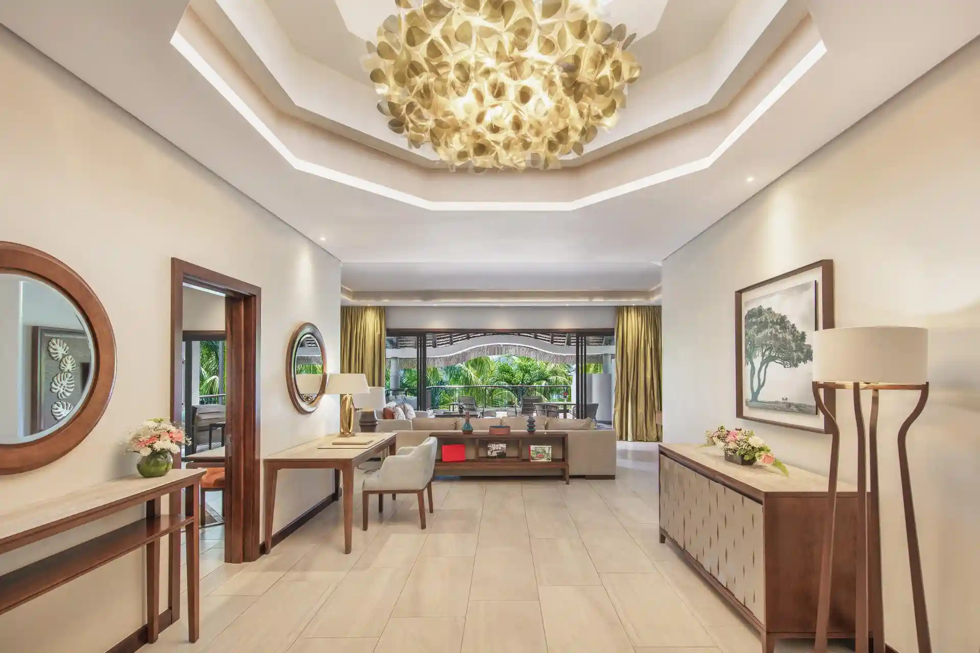 royal palm penthouse suite hallway with elegant decor, lighting, and access to rooms