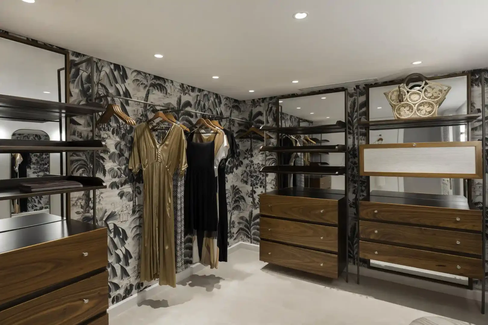 royal palm royal villa dressing room with wardrobes, shelves, drawers, and seating area