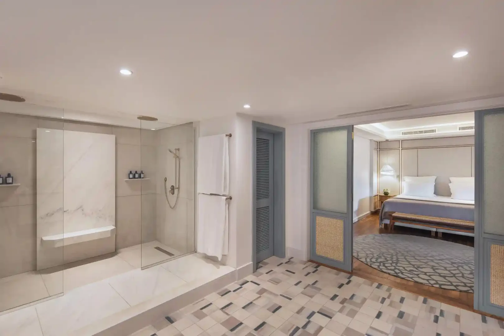 royal palm royal villa ensuite bathroom with bathtub, shower, vanity, and modern fixtures