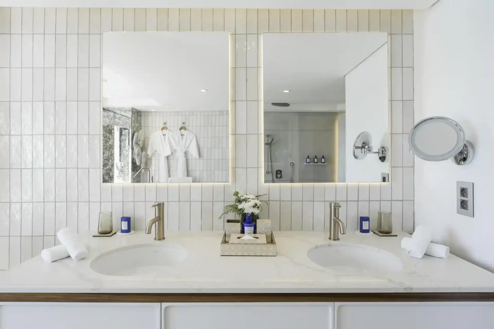 royal palm royal villa bathroom sinks with lighting fixtures and mirror