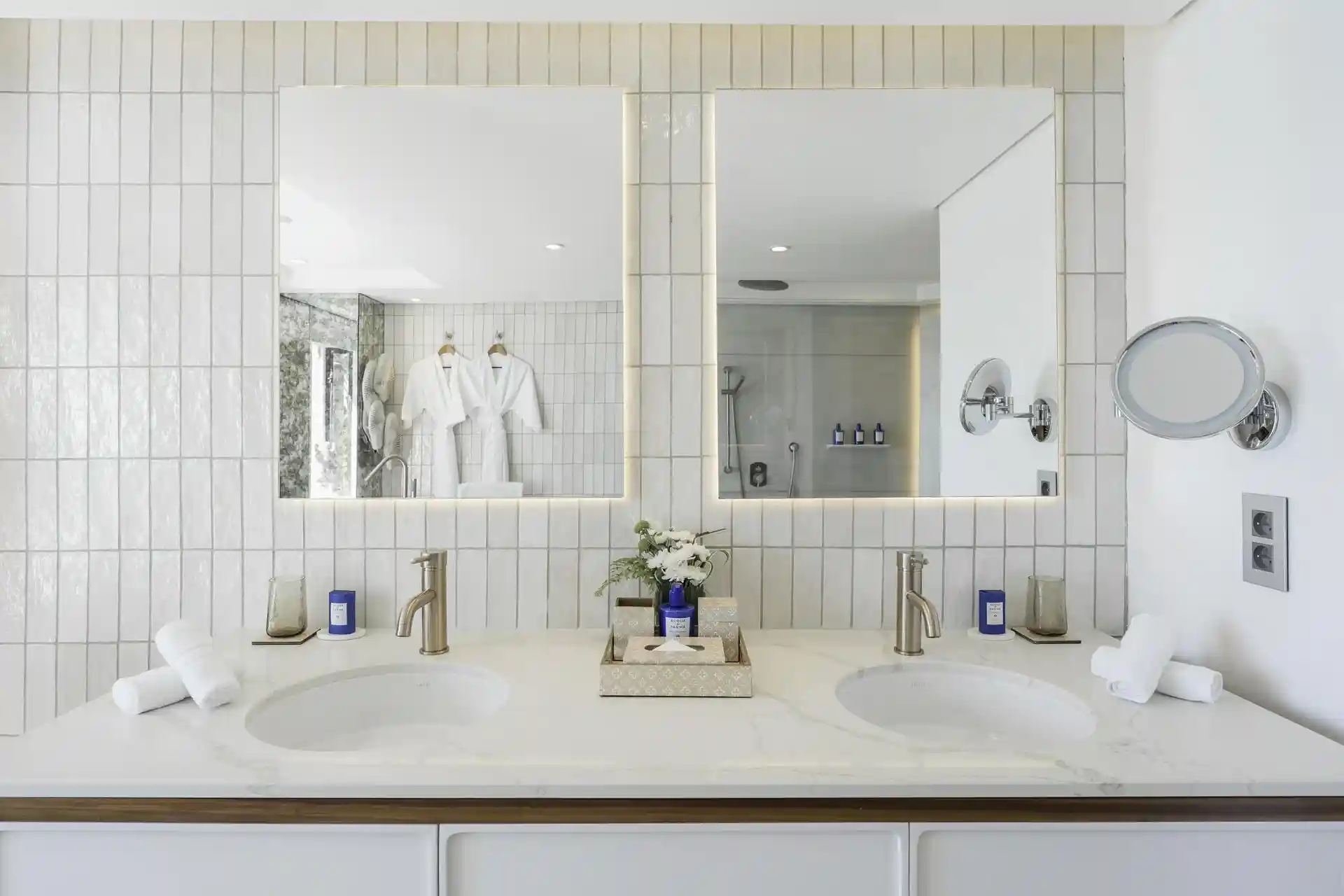 royal palm royal villa bathroom sinks with lighting fixtures and mirror