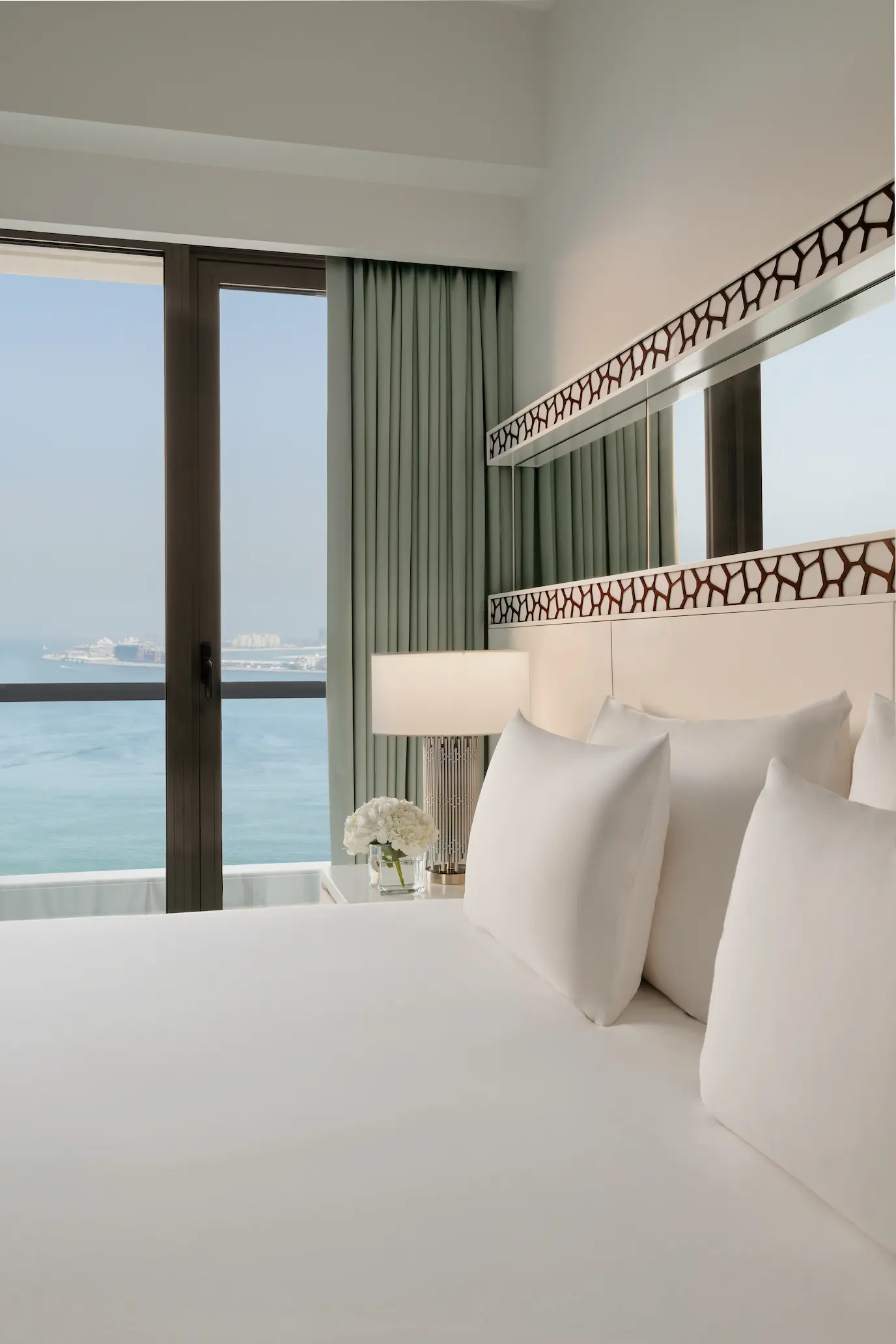 sea view club room bed at ja ocean view hotel with king bed and ocean outlook