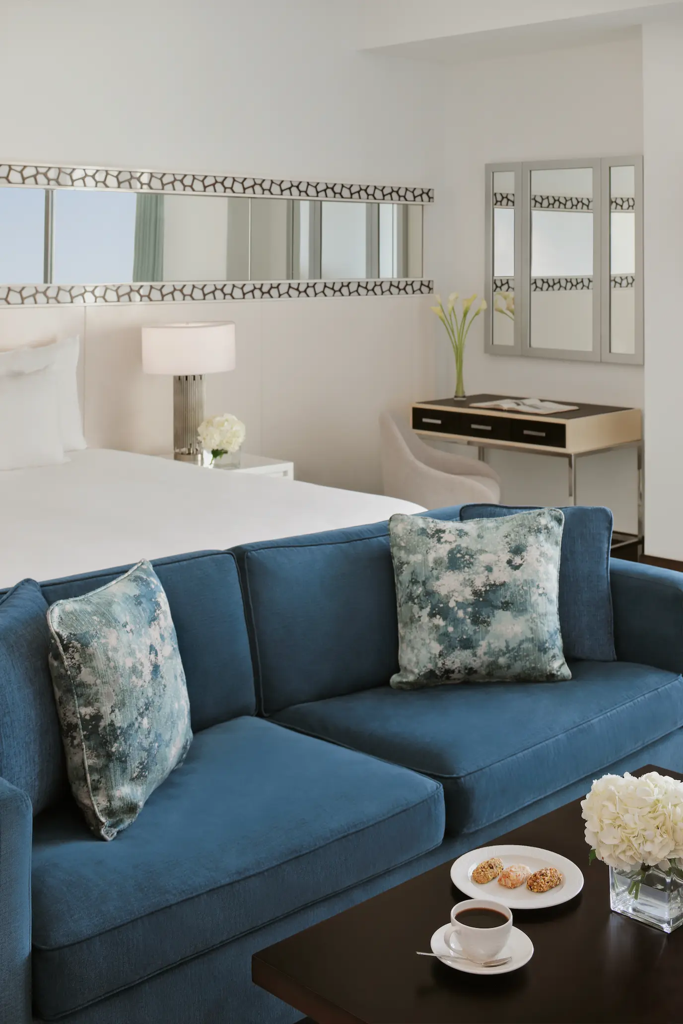 sea view junior suite sofa seating area at ja ocean view hotel