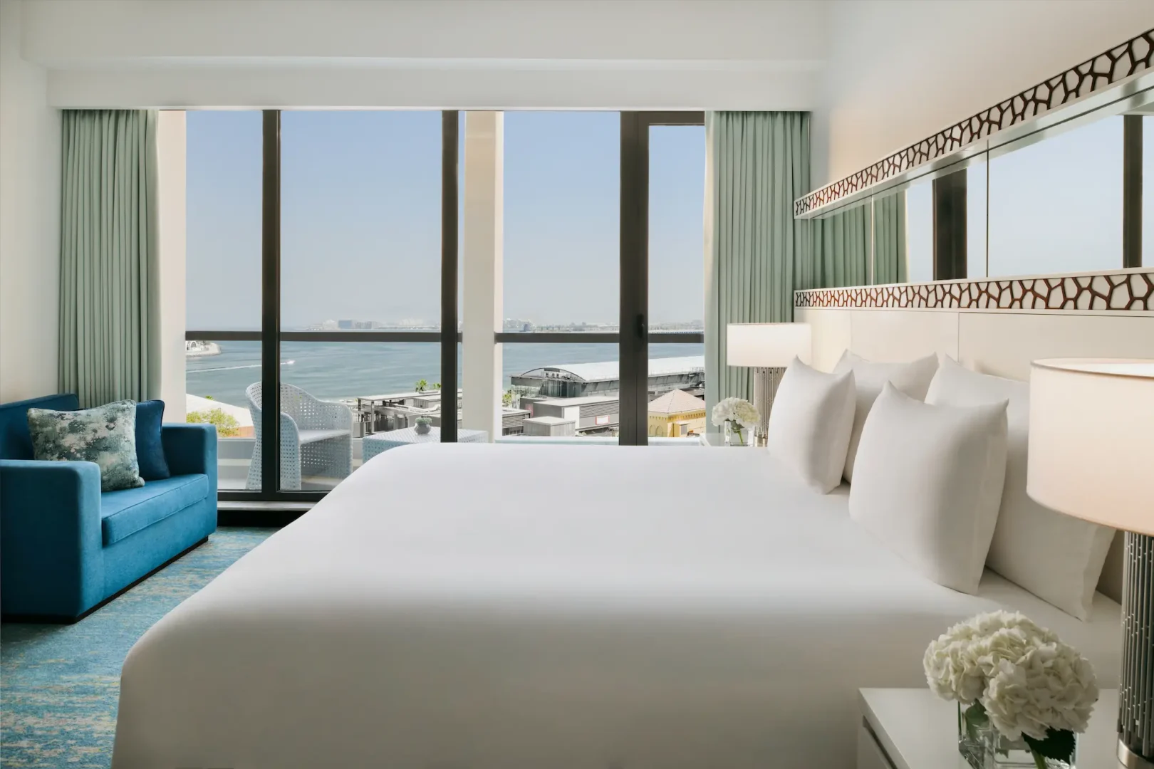 sea view room at ja ocean view hotel with king bed and ocean outlook