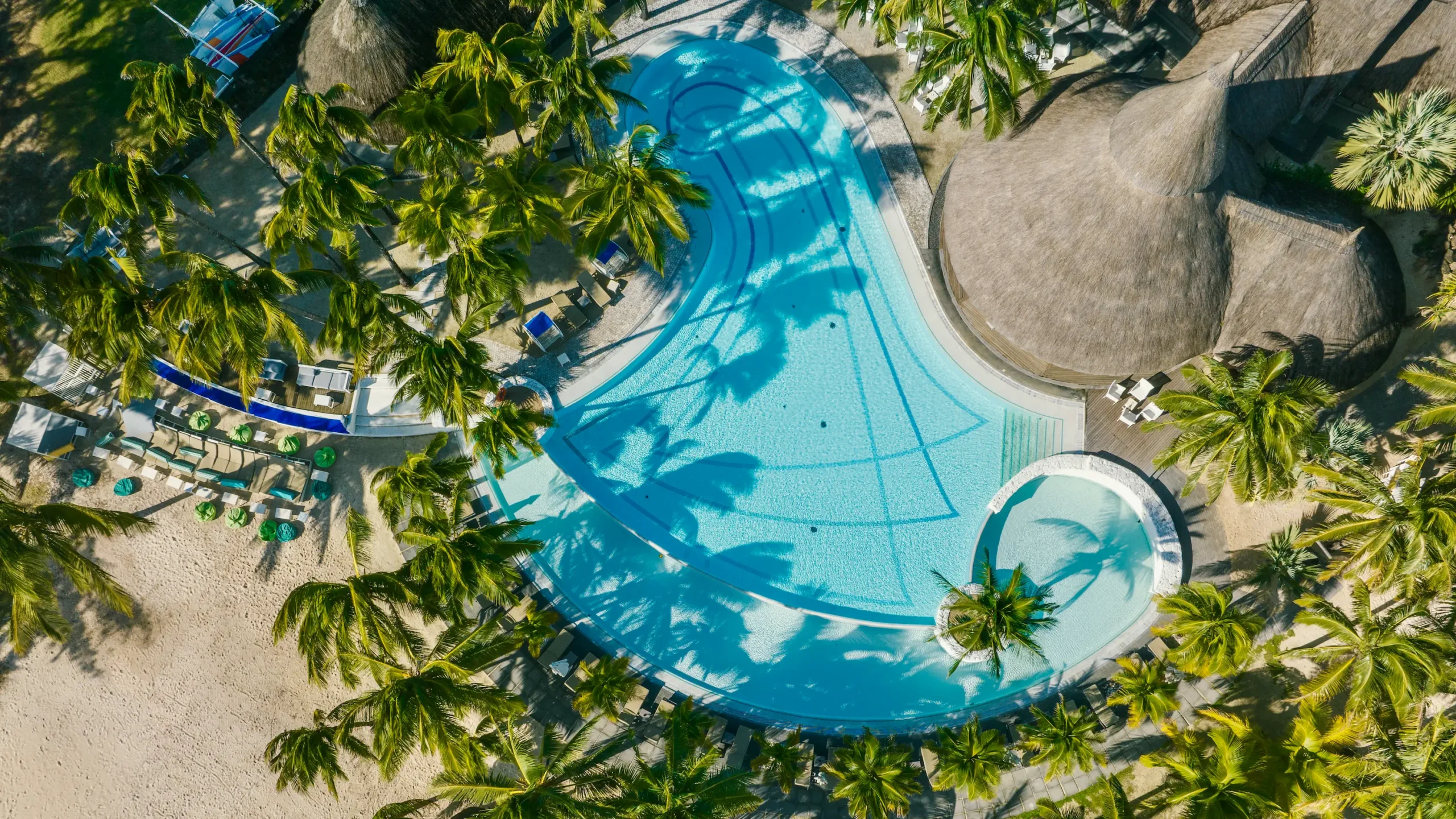 shandrani beachcomber mauritius aerial pool view overlooking tropical lagoon coastline