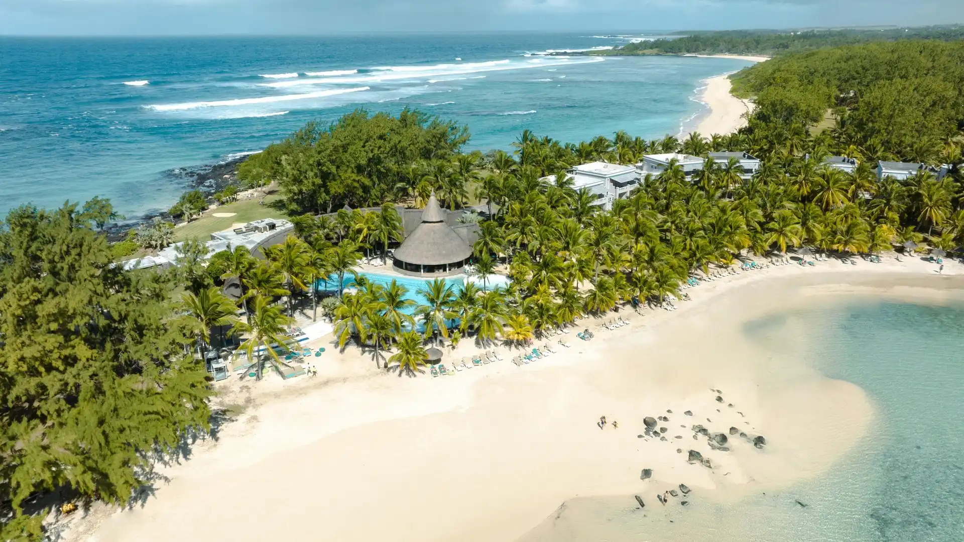 aerial beach at shandrani beachcomber resort and spa with white sand shoreline and turquoise indian ocean views perfect for sunbathing and swimming