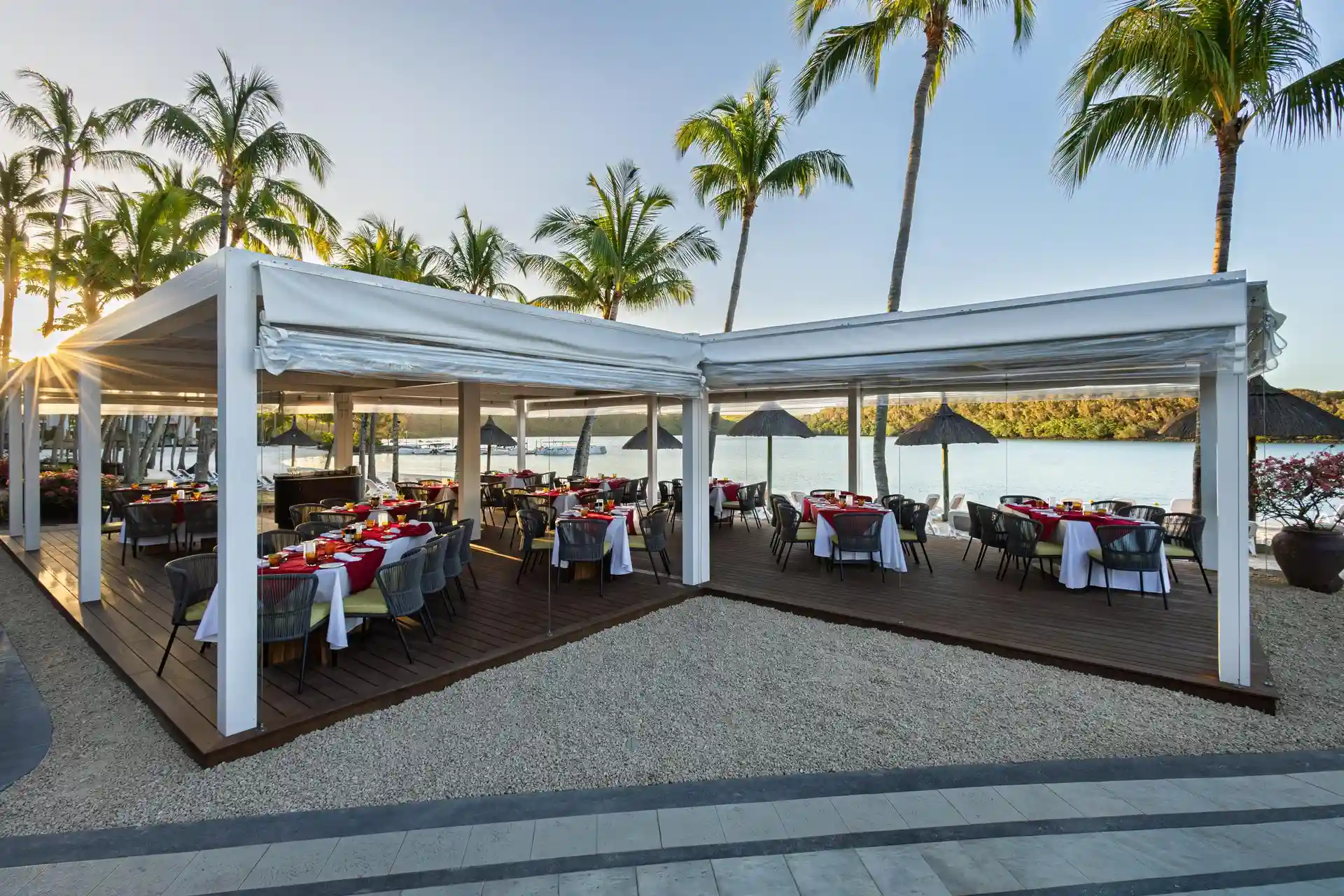 le grand port main restaurant at shandrani beachcomber resort and spa overlooking the pool and bay serving international buffet meals for breakfast, lunch, and dinner