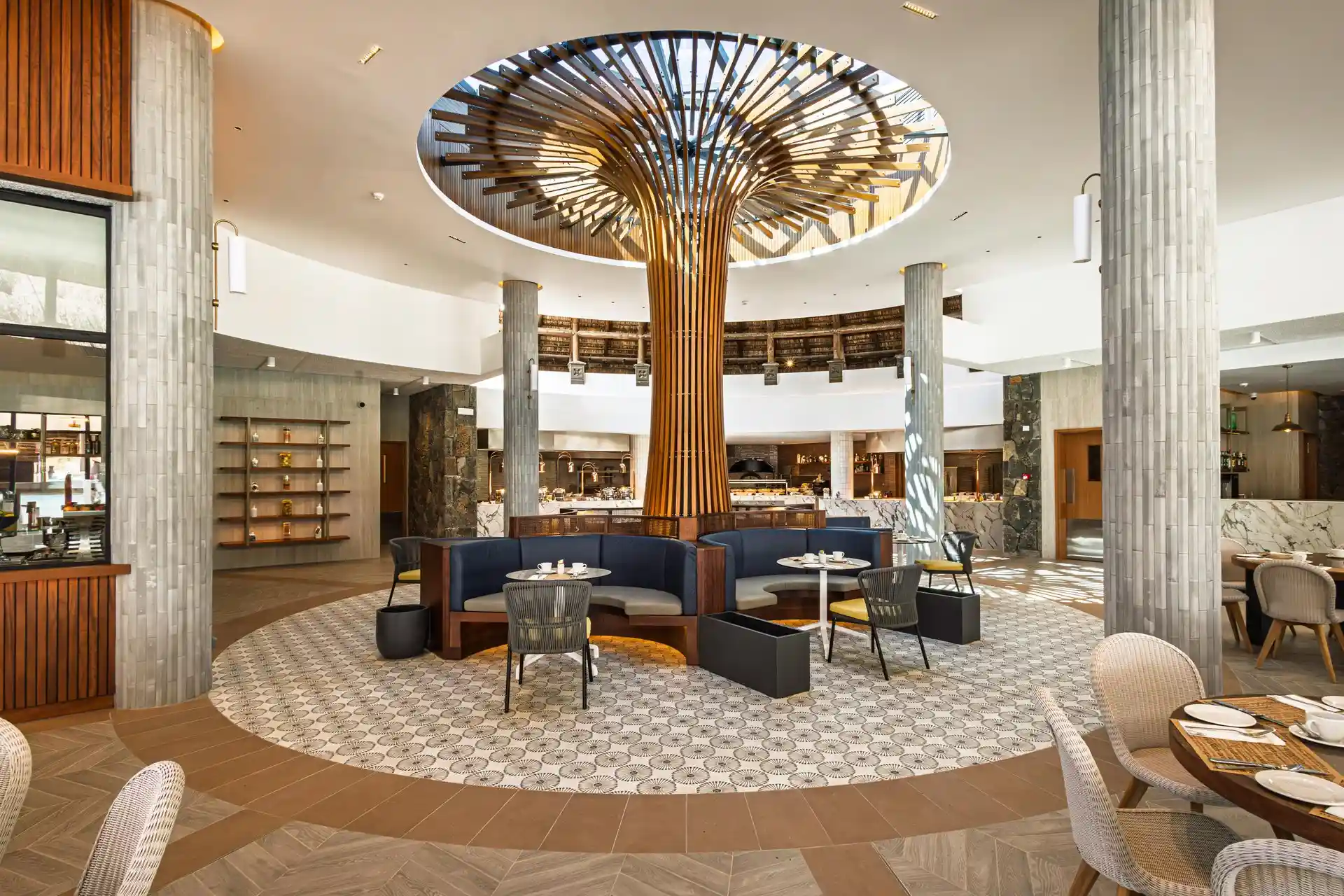 restaurant at shandrani beachcomber resort and spa serving international and local cuisine in a bright, tropical dining setting