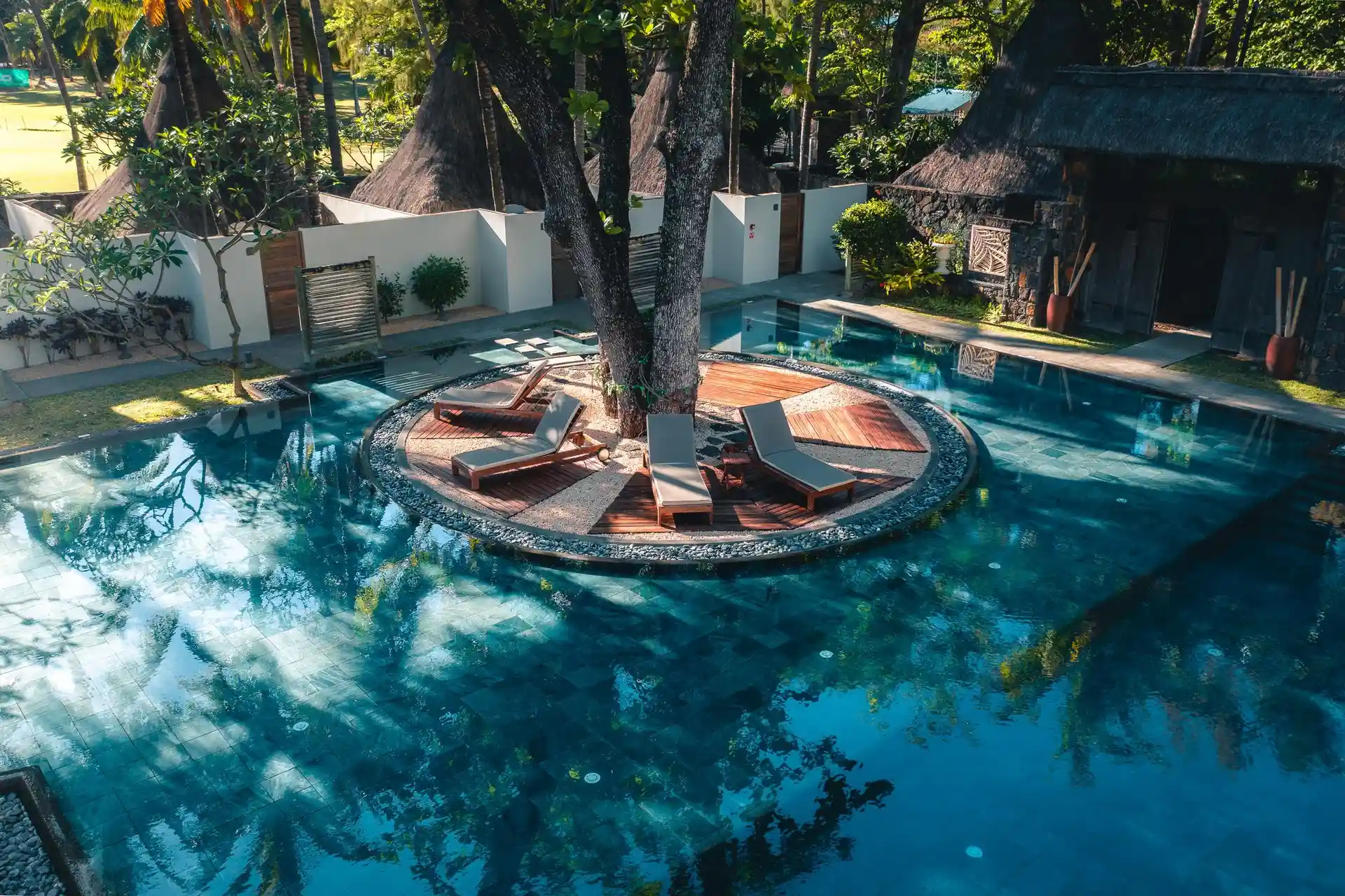 spa pool at shandrani beachcomber resort and spa with tranquil water, tropical surroundings, and relaxing treatment area