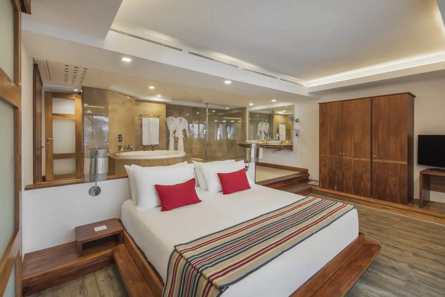 spacious senior suite bedroom at shandrani resort with king-size bed and modern decor