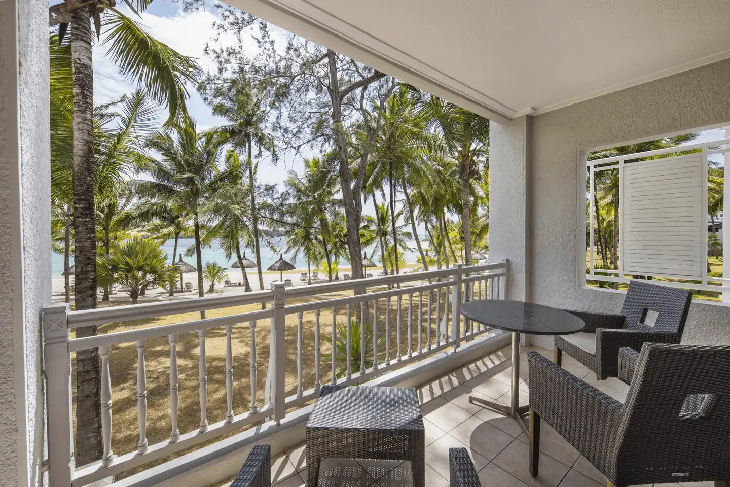 shandrani mauritius two-bedroom deluxe family apartment balcony with sea view hotel