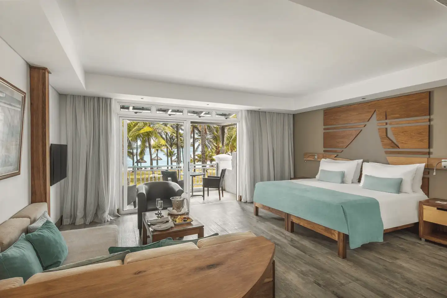 shandrani mauritius two-bedroom deluxe family apartment balcony with scenic ocean or garden view hotel