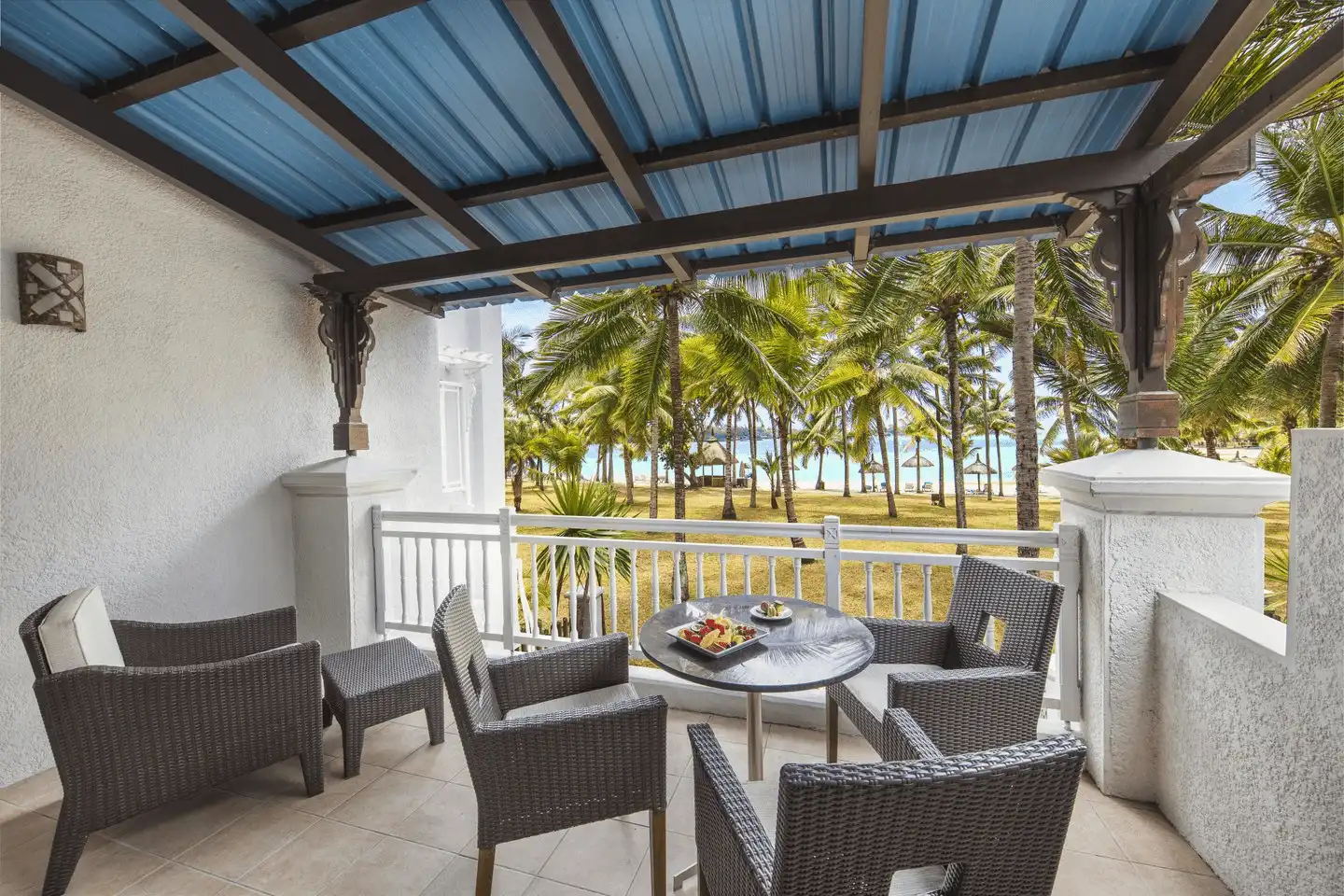 handrani mauritius two-bedroom deluxe family apartment with balcony hotel outdoor view