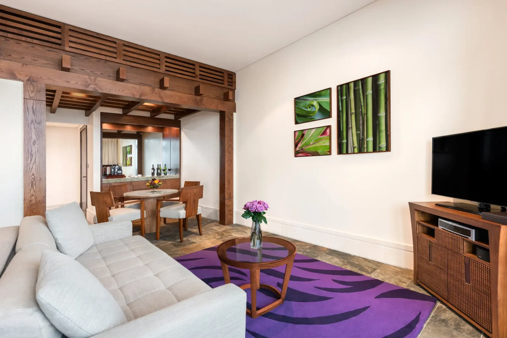 living area in prestige suite at sofitel dubai the palm with modern decor, comfortable seating, and elegant furnishings