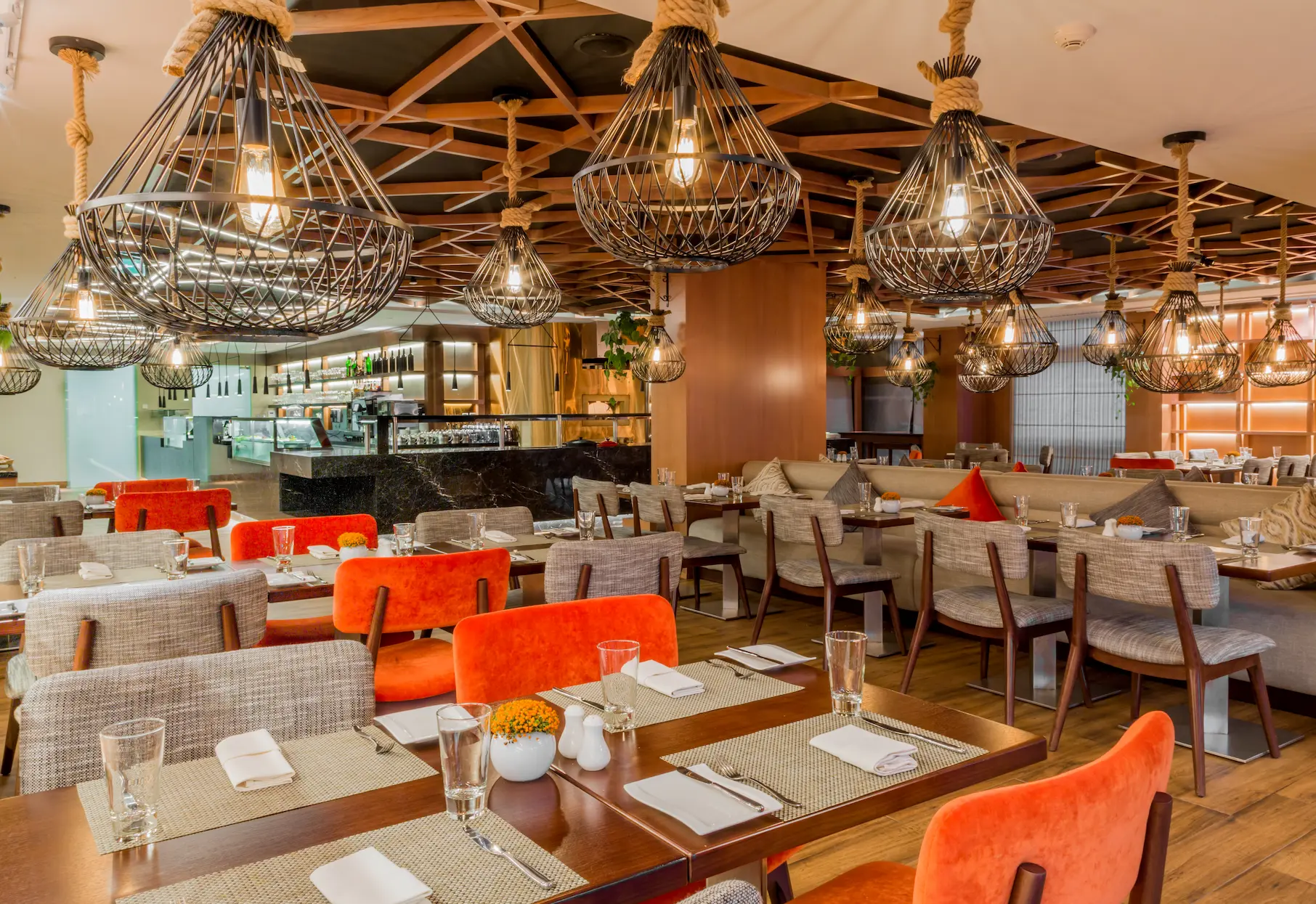 the world eatery at sofitel dubai the palm featuring international buffet stations and contemporary dining space