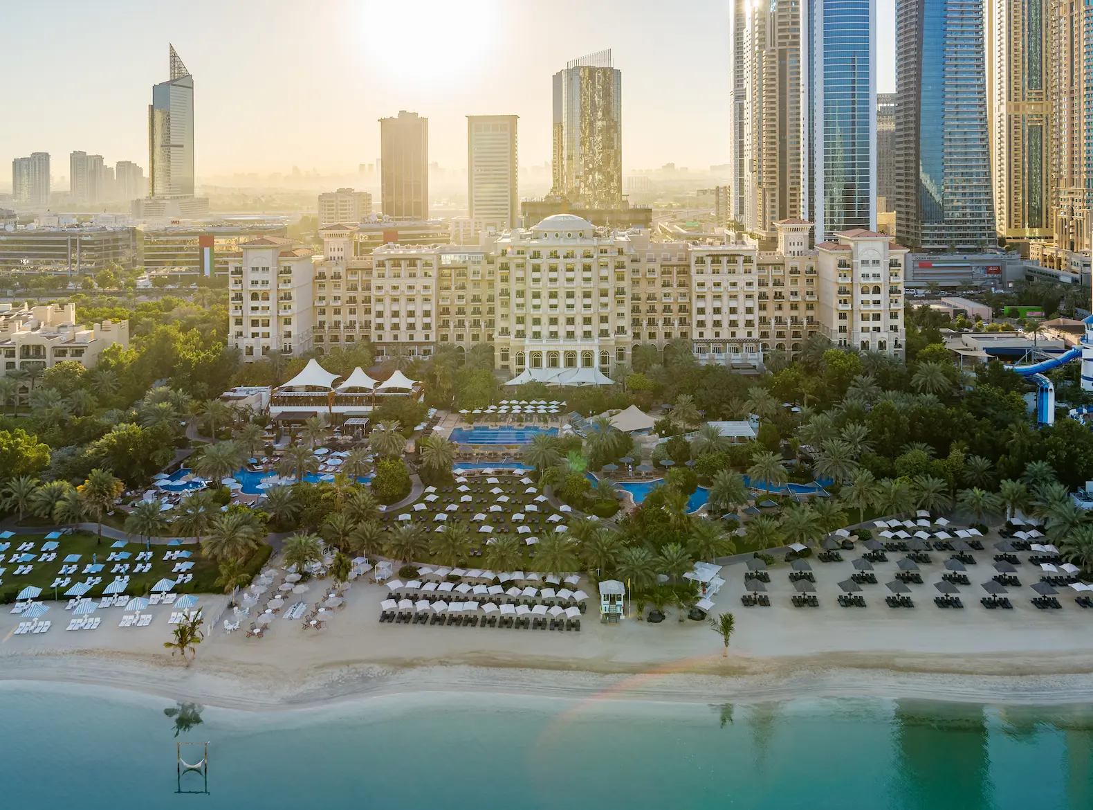 aerial view of the westin dubai mina seyahi along jumeirah beach with pools and beachfront