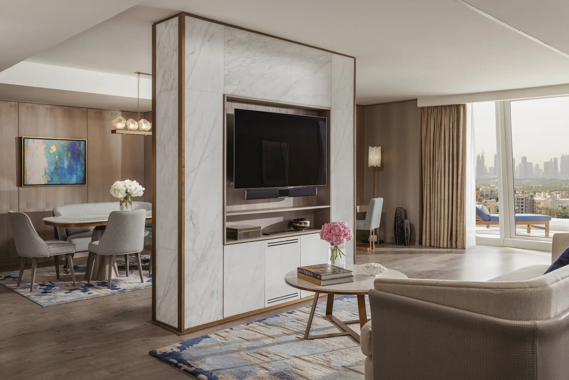 living room in three bedroom suite at Jumeirah Beach Hotel with spacious seating area, modern décor and panoramic arabian gulf views