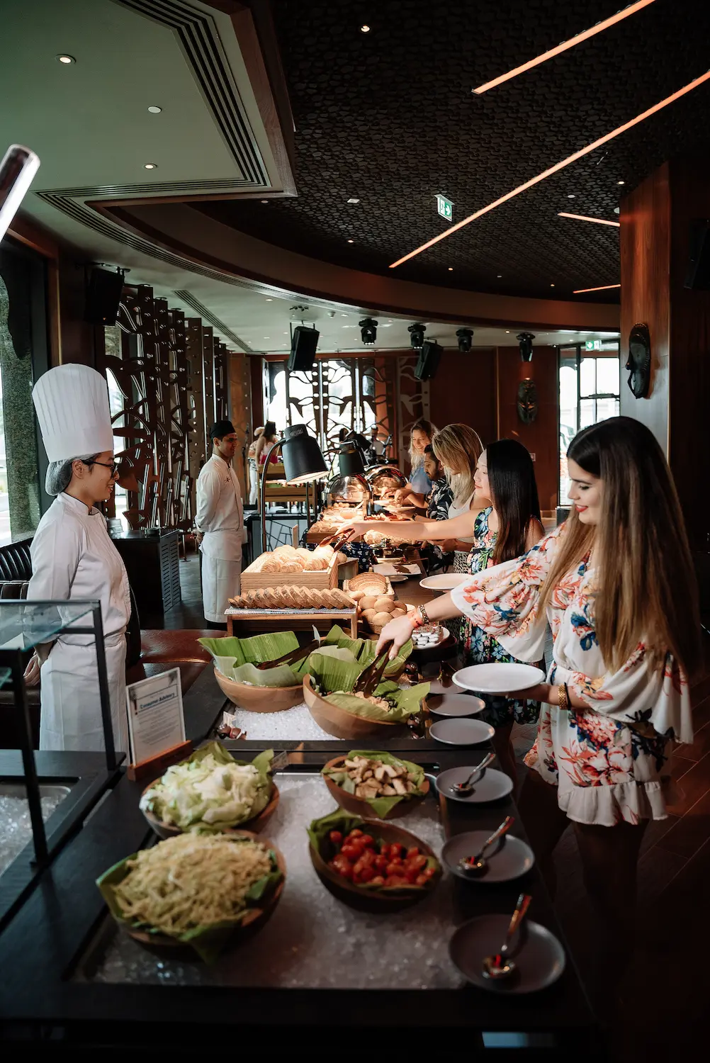 trader vic’s dubai at hilton dubai palm jumeirah with tropical décor and wood-fired dining