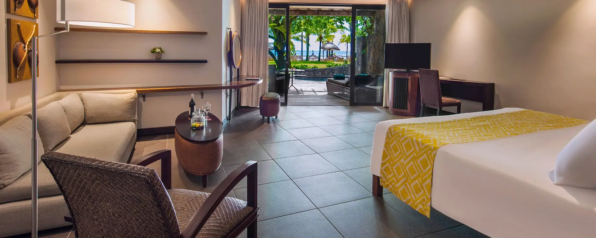 trou aux biches beachfront suite with pool terrace featuring outdoor seating, private pool, and ocean view