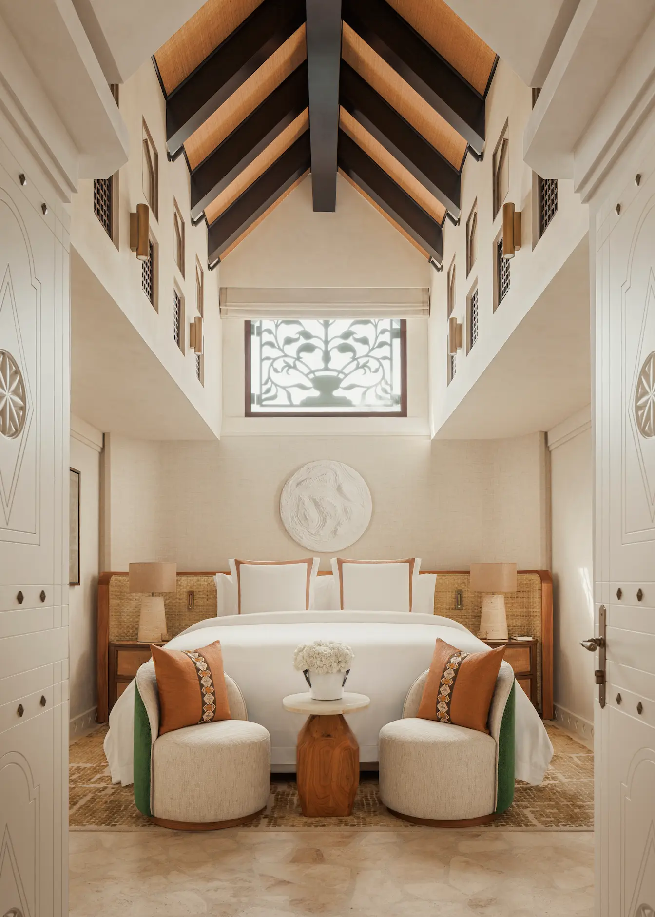 master bedroom in two bedroom al bahar villa at Jumeirah Beach Hotel with king bed, modern décor and villa terrace views