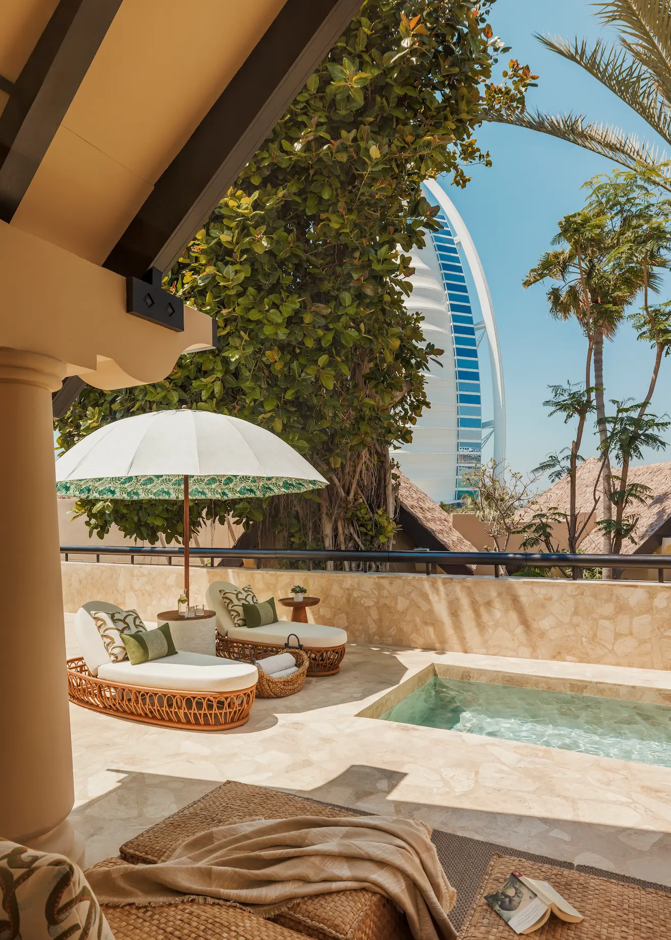 styled terrace of two bedroom al bahar villa at Jumeirah Beach Hotel with outdoor seating, décor accents and arabian gulf views
