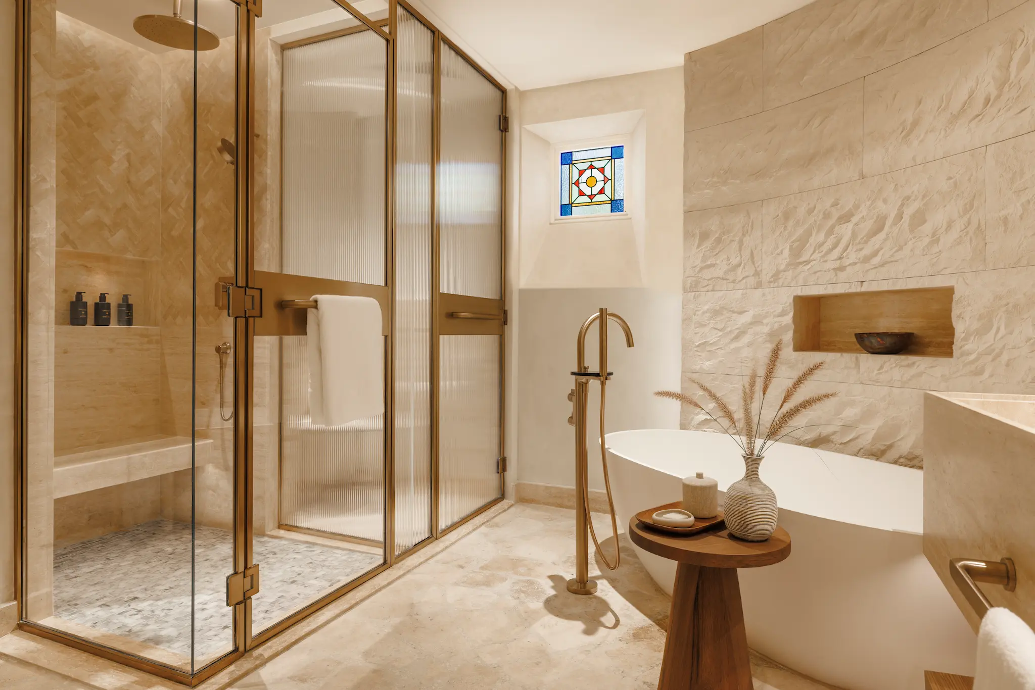 bathroom in twin bedroom of two bedroom al bahar villa at Jumeirah Beach Hotel with modern fittings, bathtub and elegant décor
