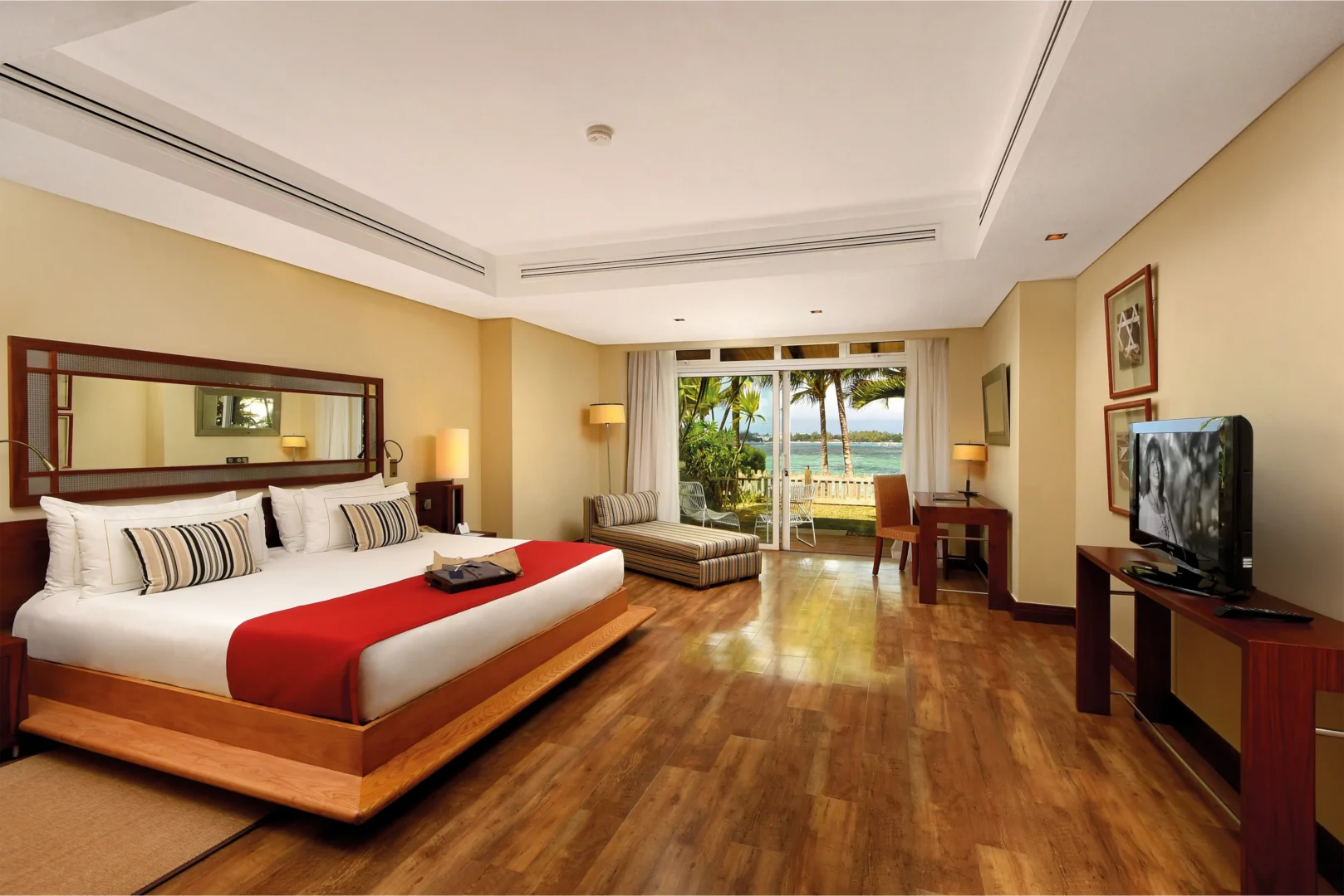 master bedroom in two-bedroom family suite at shandrani resort with king-size bed and elegant decor