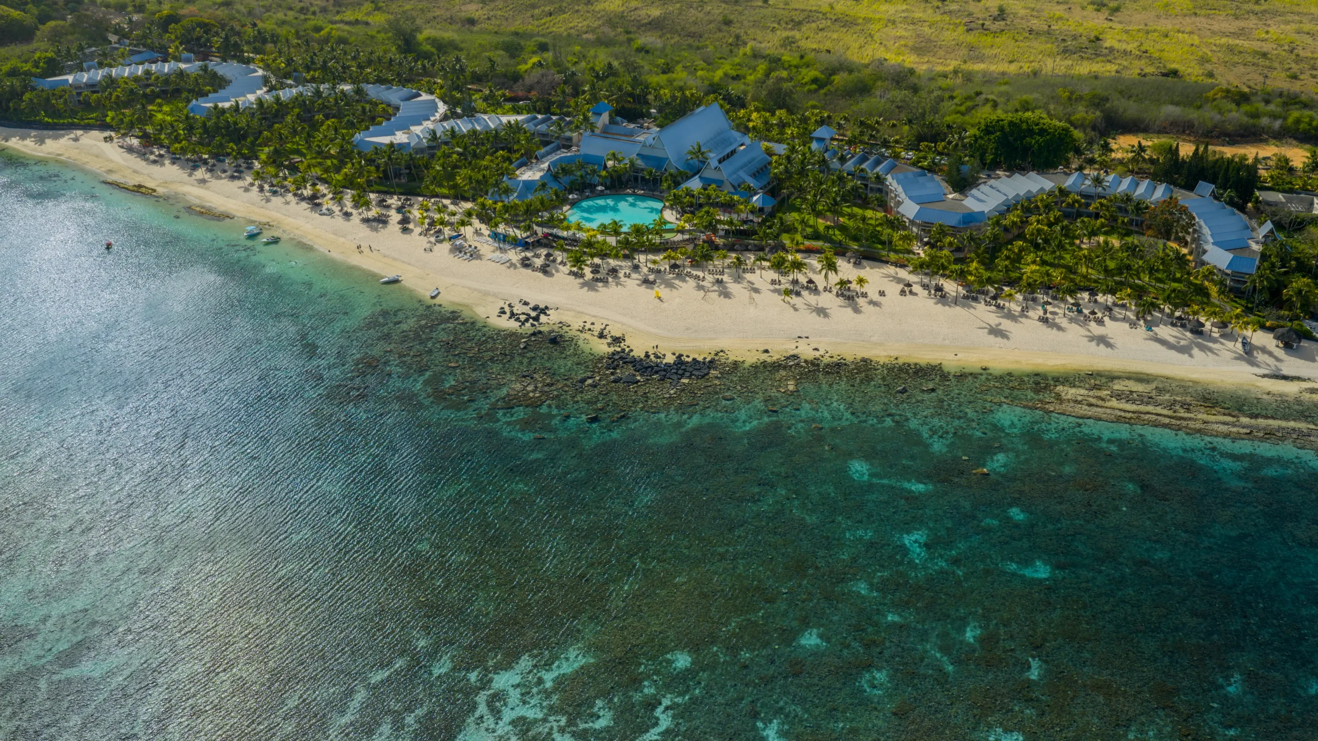 victoria beachcomber mauritius aerial exterior view of the whole resort along the lagoon coastline