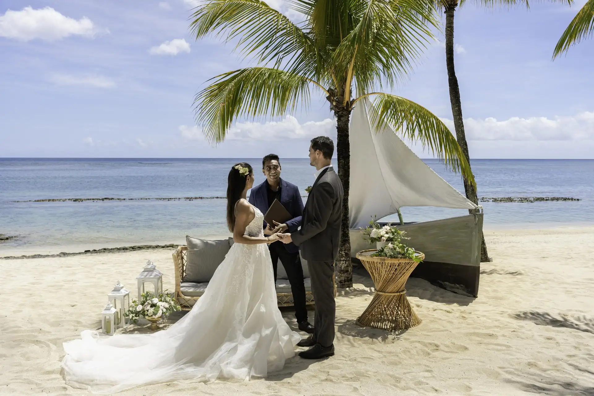 victoria mauritius wedding ceremony by the ocean with bride and groom at tropical beach resort
