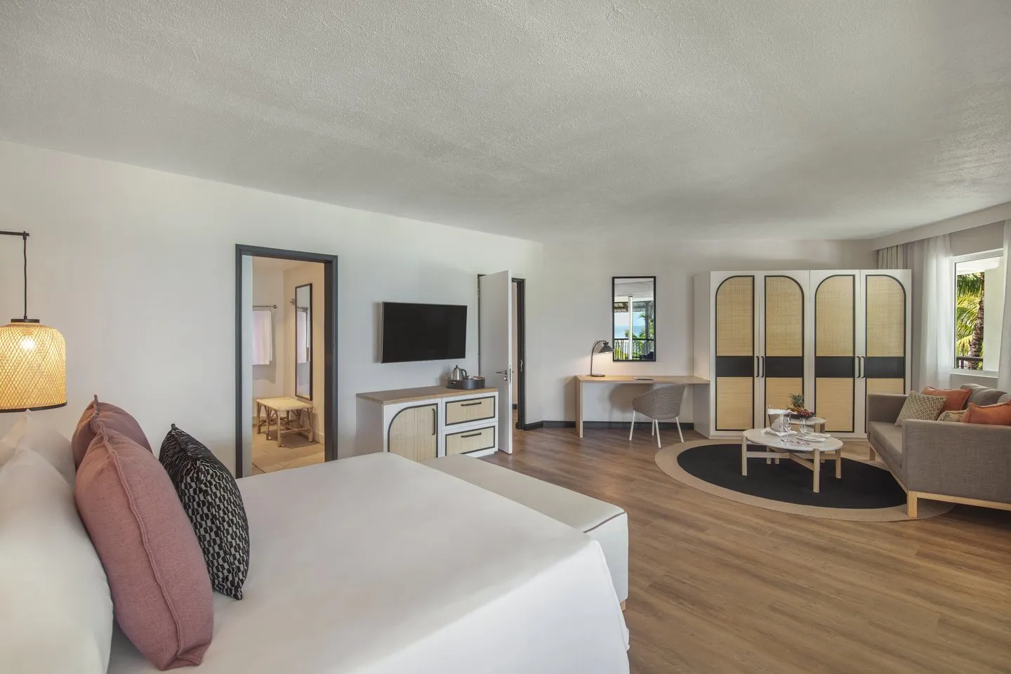 victoria mauritius two-bedroom family apartment bedroom with lounge hotel interior
