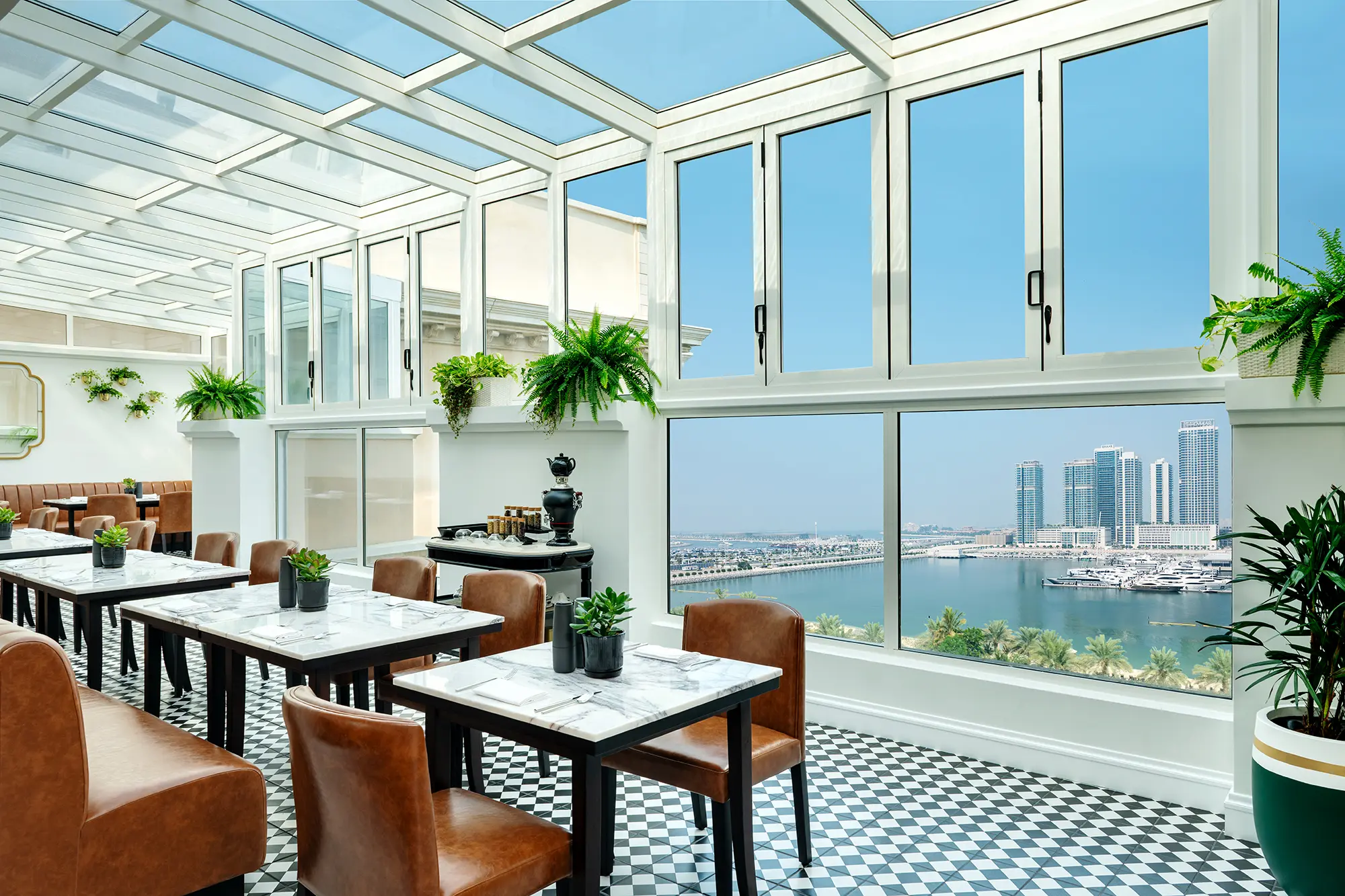 winter garden at the westin dubai mina seyahi with outdoor seating, festive décor, and relaxed garden atmosphere