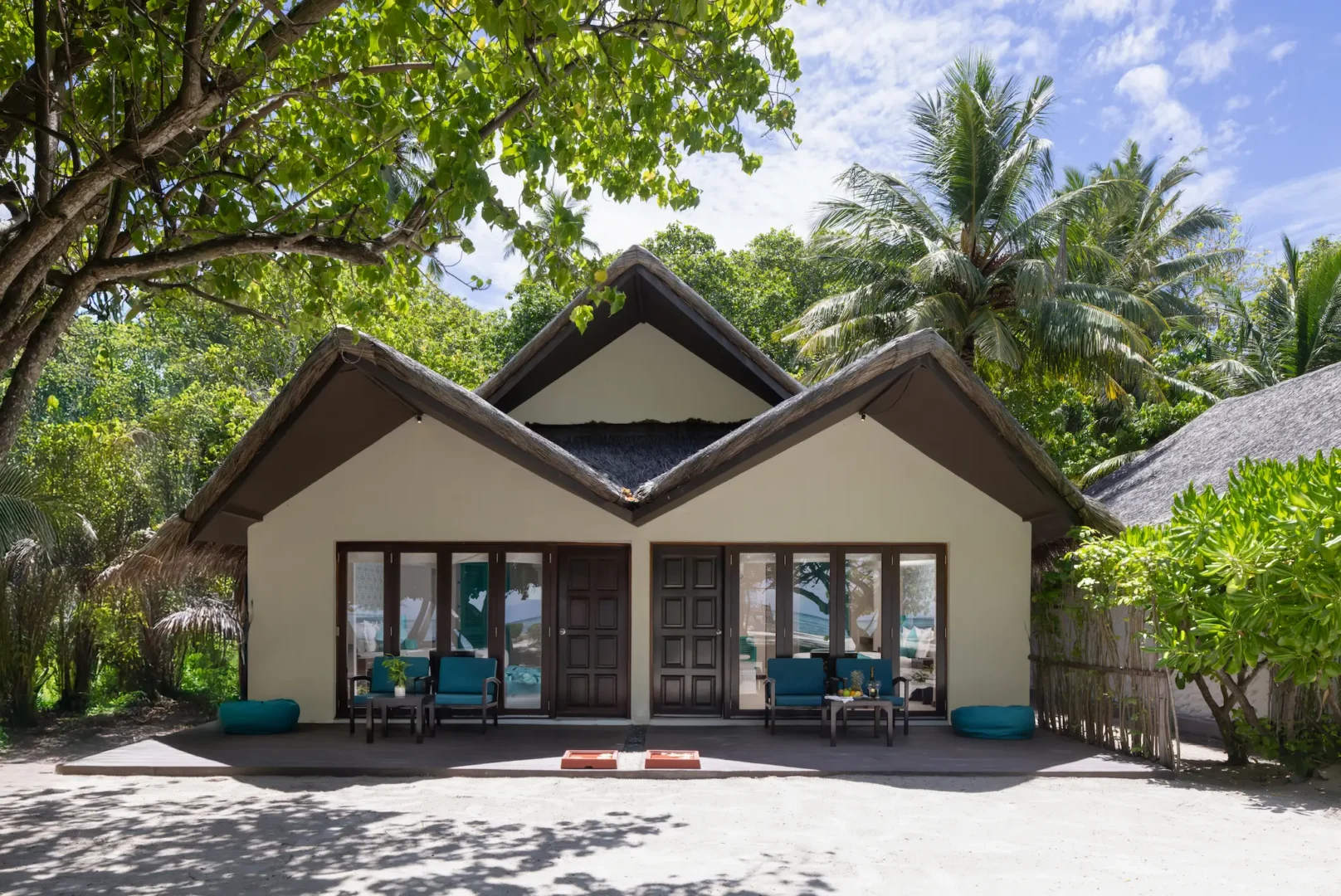 beach villa exterior at adaaran select hudhuranfushi maldives